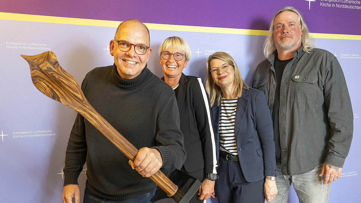 Johannes Ahrens (Stadtpastor in Flensburg), Katja Wrobel (Sportpiraten e.V. Flensburg), Birgit Lunde (Pastorin St. Petri Flensburg) und Dirk Dillmann (Sportpiraten e.V. Flensburg). 